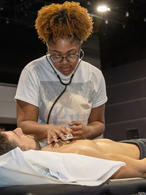 Student working in a clinical setting